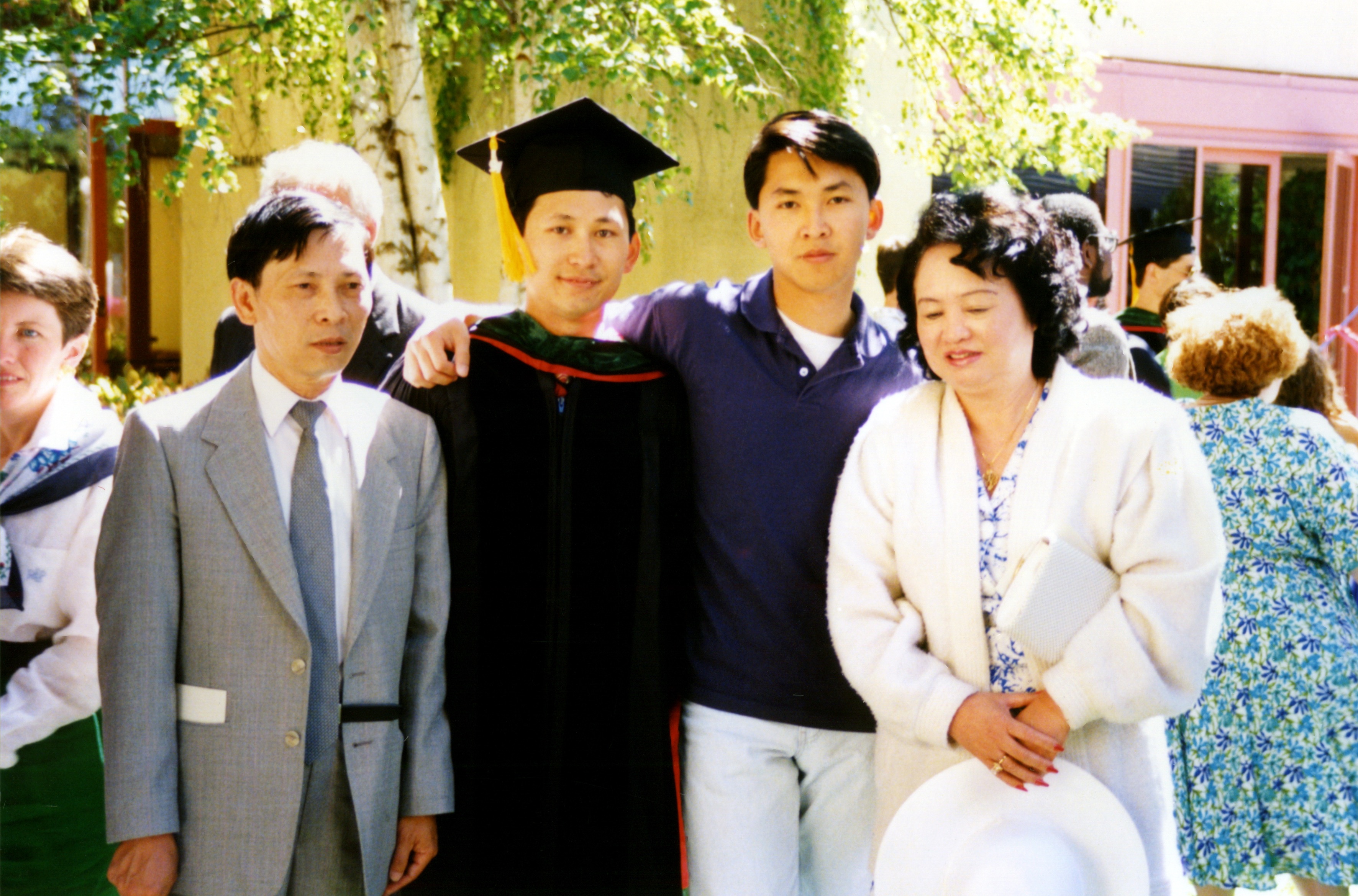 Tung with parents and brother